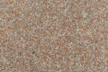 Granite texture of old wall of polished pink granite