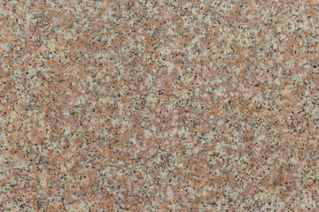 Granite texture of old wall of polished pink granite
