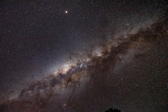 Milky way in clear night sky. Milky Way is the galaxy that contains our Solar System. The descriptor "milky" is derived from the galaxy's appearance from Earth