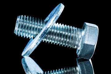 Stainless bolt washer screwbolt on black background