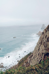 Coast of Portugal, Cape Cabo da Roca - the westernmost point of Europe. Ocean waves  - 221087484