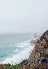 Coast of Portugal, Cape Cabo da Roca - the westernmost point of Europe. Ocean waves  - 221087496