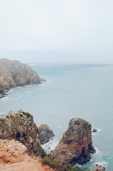 Coast of Portugal, Cape Cabo da Roca - the westernmost point of Europe. Ocean waves  - 221087653