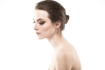 Fototapeta premium Beautiful brunette woman with healthy skin and hair isolated on white