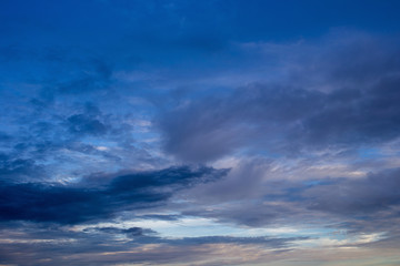 Colorful dramatic sky with cloud at sunset.Sky with sun background