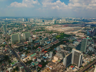 Fototapeta premium Bangkok city building business district with sky cloud aerial view