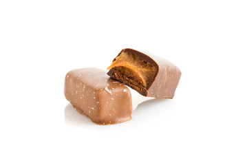 chocolate candy with salted caramel  isolated on white