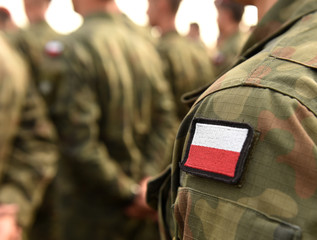 Polish patch flag on soldiers arm. Poland military uniform. Poland troops