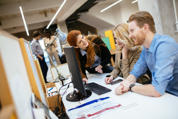 Businesspeople working in office