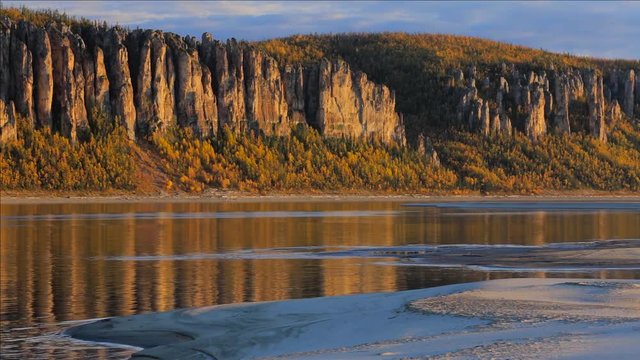 Rock pillars and river in taiga forest. Siene - tributary of the Lena river in Yakutia, Siberia