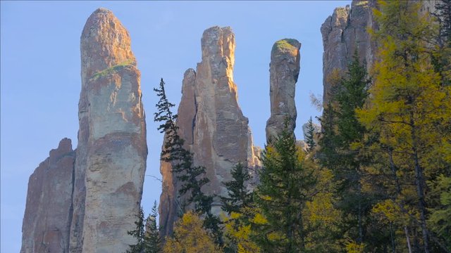Rock pillars and river in taiga forest. Siene - tributary of the Lena river in Yakutia, Siberia