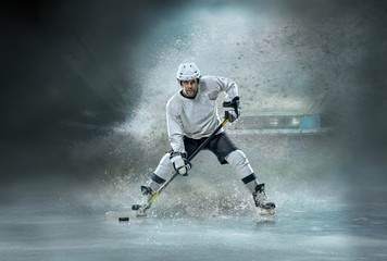Caucasian ice hockey Players in dynamic action in a professional