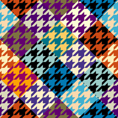 Seamless geometric pattern. Classic Hounds-tooth pattern in a patchwork plaid style. Vector image.