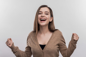 Beaming student. Happy beaming student feeling extremely satisfied after passing exam on image...