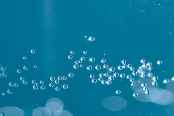 air bubbles in water macro background / blue background abstract bubbles in water