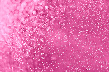 pink water bubbles background / fresh summer background pink air bubbles in water