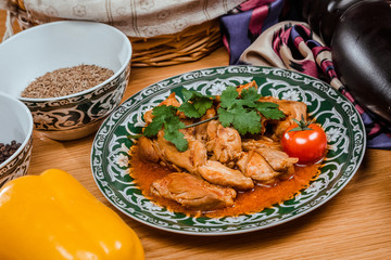 Traditional Uzbek oriental cuisine. Uzbek family table from different dishes for the New Year holiday. The background image is a top view.