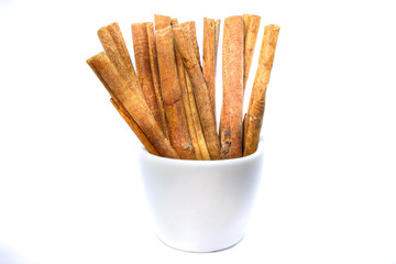 cinnamon sticks in a cup