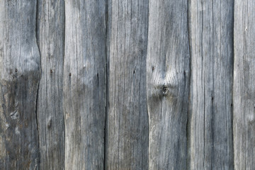 old wooden Board with a beautiful texture and knots as background.