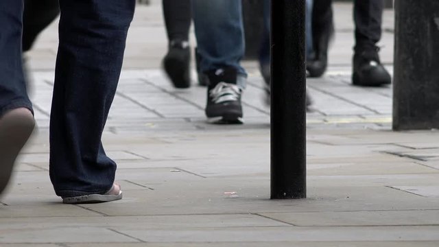 Close up of feet walking in the city of London