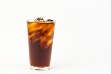 Cola in glass with ice on white background