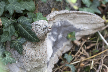 Historic Statue on the mystery old Prague Cemetery, Czech Republic