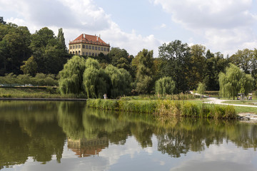 Fototapeta na wymiar Chateau - the governors Summerhouse - in the largest Park in Prague – Stromovka - the Royal Tree-tree, Czech Republic