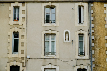 Symmetrical facade of french building at the old town