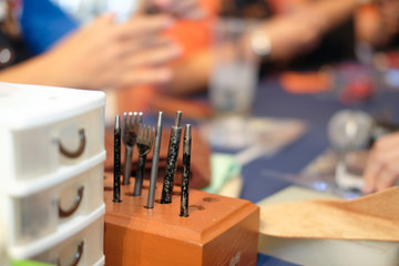 leather craft DIY instrument tool. craftsman working desk