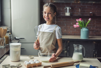 Little girl baking