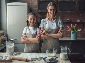 Mom and daughter baking