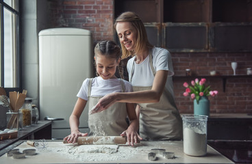 Mom and daughter baking