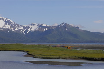 The coast whih the high mountains of una bay Katmai