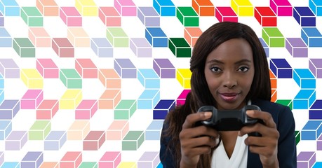 Woman playing computer game with colorful geometric pattern