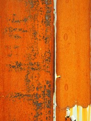 Fence covered with red rust