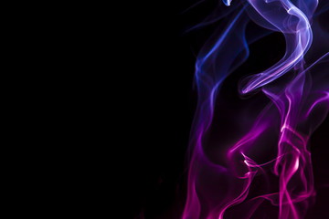 Obraz premium Colored smoke on black background