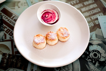 Russian syrniki or sirniki, cottage cheese pancakes