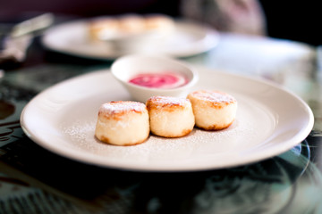 Russian syrniki or sirniki, cottage cheese pancakes