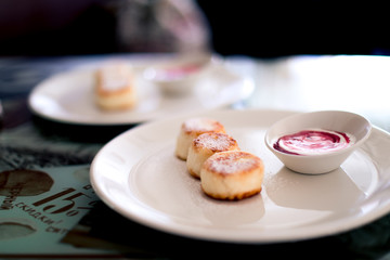 Russian syrniki or sirniki, cottage cheese pancakes
