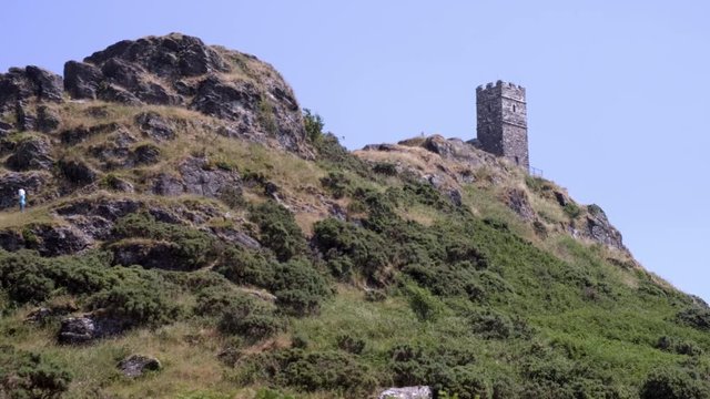 Static long shot of St Michael&rsquo;s Church atop Brentor on Dartmoor