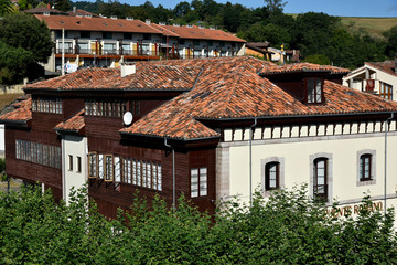 Fototapeta na wymiar roofs with clay tiles in a rainy village
