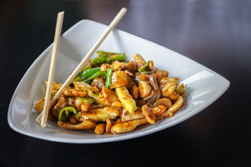 Chinese Food, Fried Chicken Stir served on a white plate