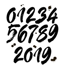 set of calligraphic acrylic or ink numbers. ABC for your design, brush lettering on a white background with blots