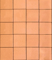 Orange floor tiles pattern. Background texture