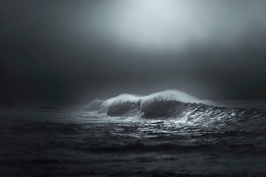 Giant waves breaking in the mist lighted by sun, Lahinch, Clare, Ireland