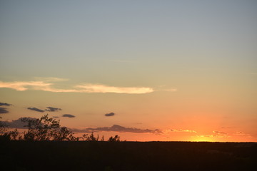 dramatic orange sunset on top of a mountain