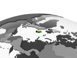 Jamaica with flag on globe