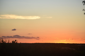 dramatic orange sunset on top of a mountain