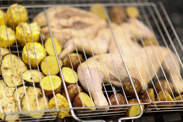 cooking on chargrill chicken barbeque and vegetables mix