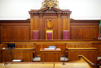Empty courtroom, with old wooden paneling